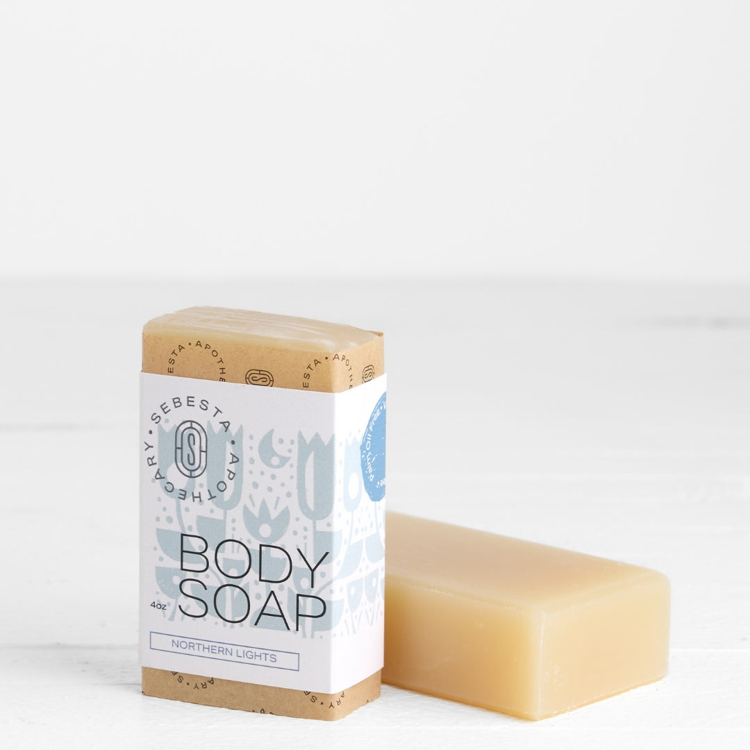 Body soap bar with packaging on a white background