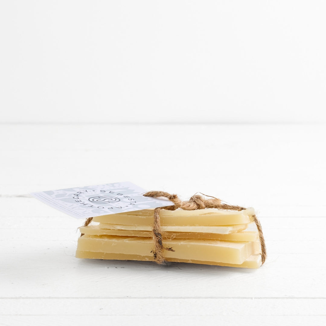 Sebesta Apothecary bundled sticks of soap with a label on a white background
