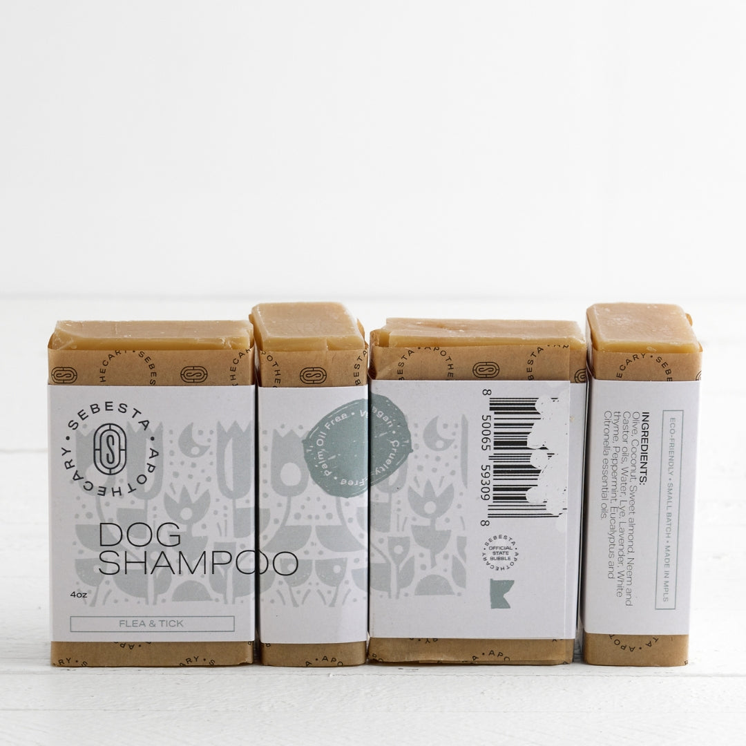 4 bars of Dog Shampoo Soap with Sebesta Apothecary Branding on a white background