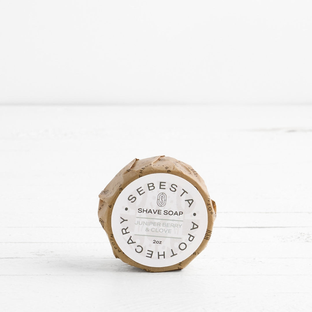 Front label of round Soap in wrapper with Sebesta Apothecary Branding on white background