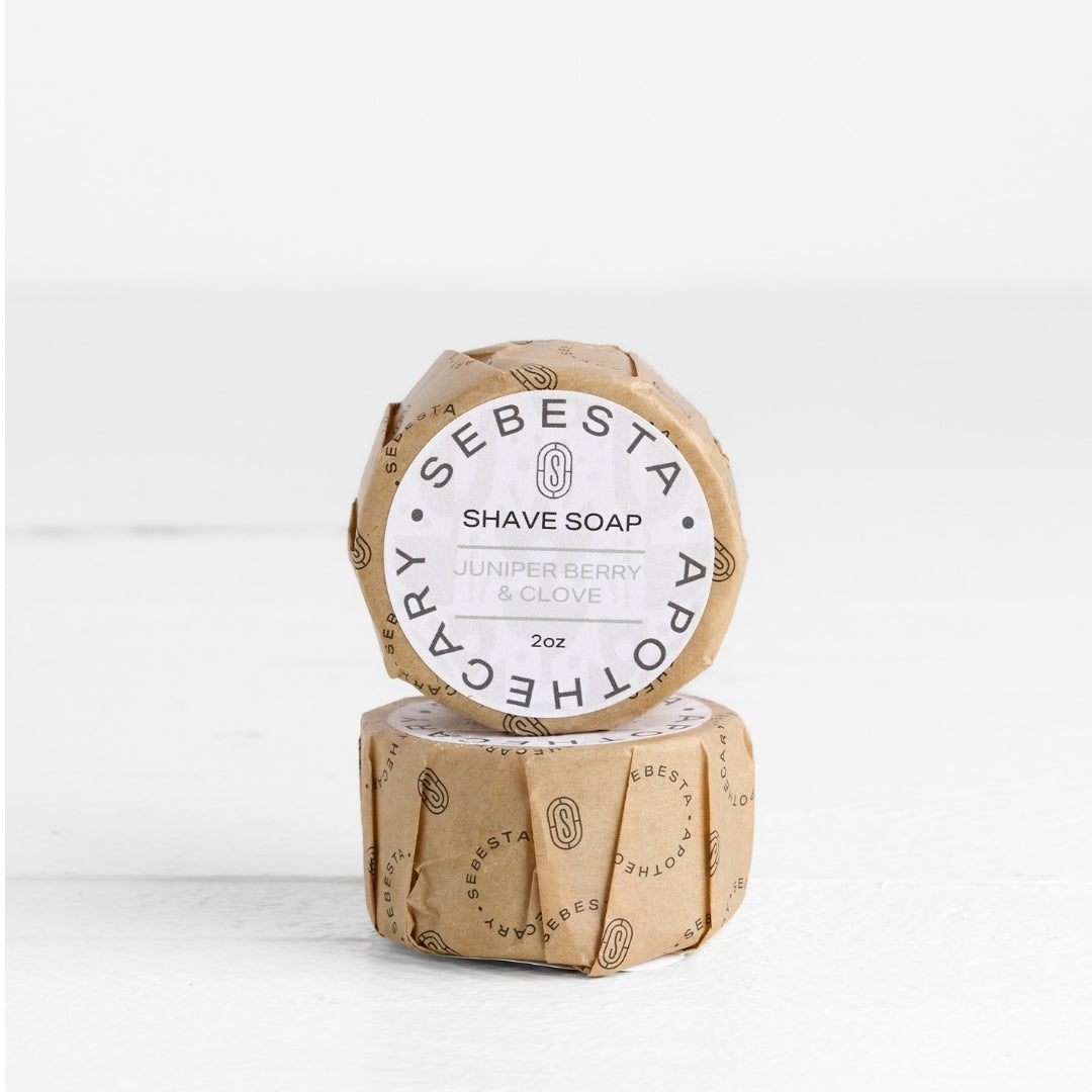 2 round bars of soap stacked with Sebesta Apothecary Branding on white background