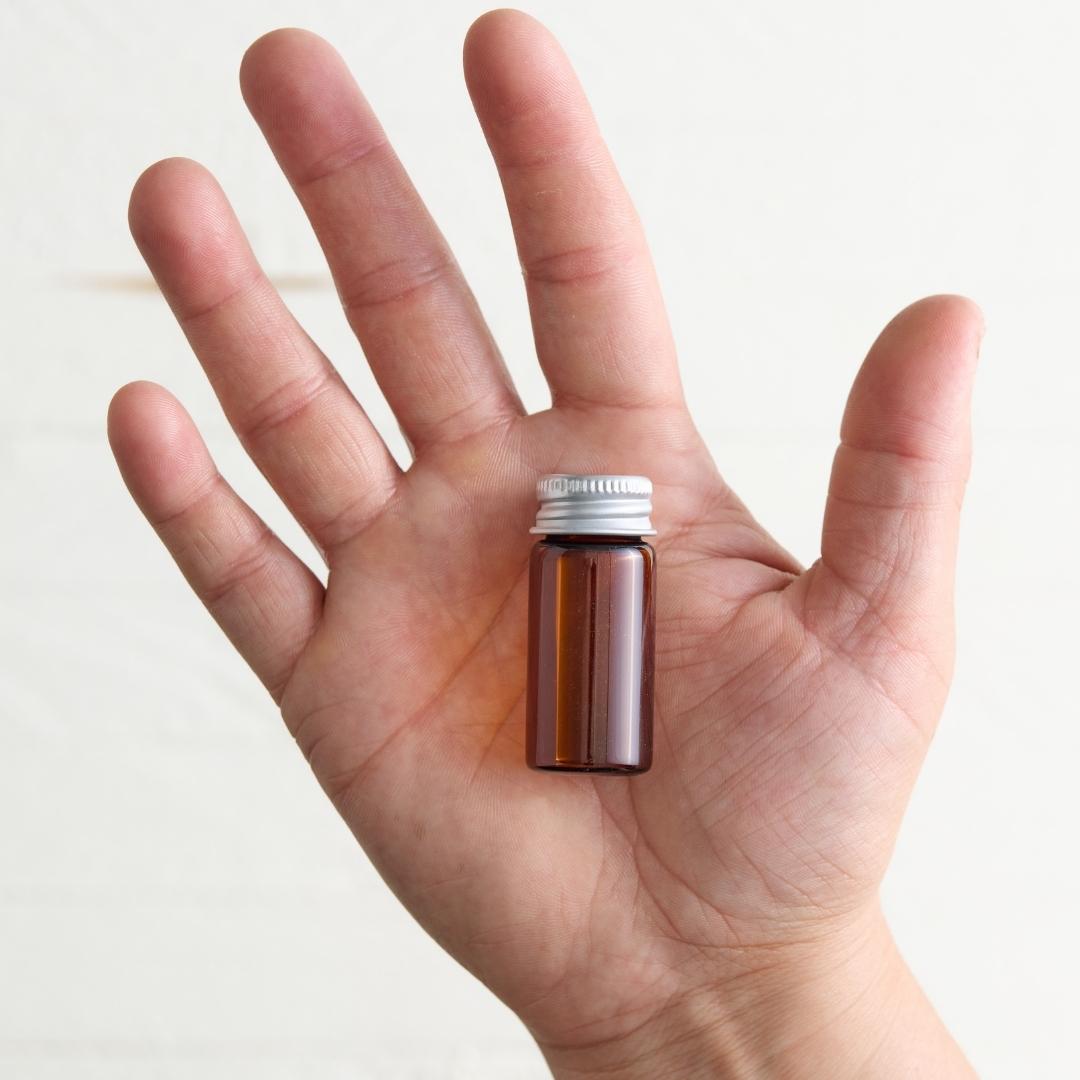 Sebesta Apothecary Lash Serum Vial in Hand
