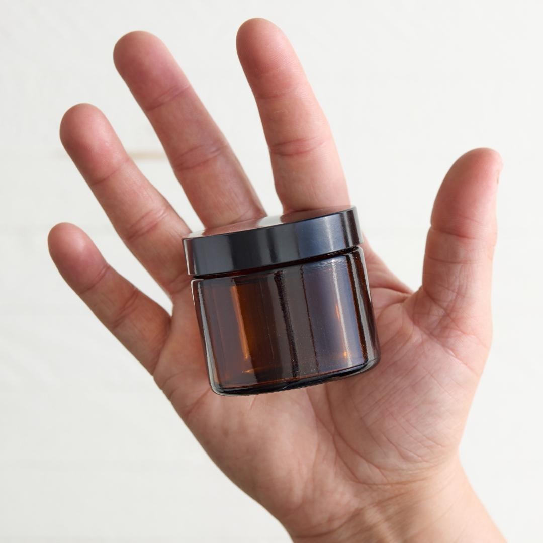 Sebesta Apothecary Shea Lotion 2oz jar in Hand