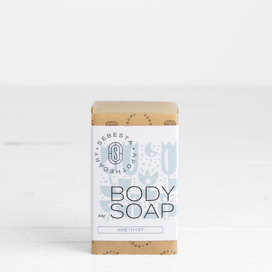 Body soap bar with packaging on a white background