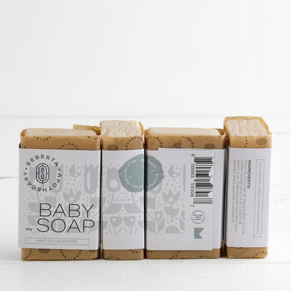 4 bars of Baby Soap Sebesta Apothecary Branding on a white background