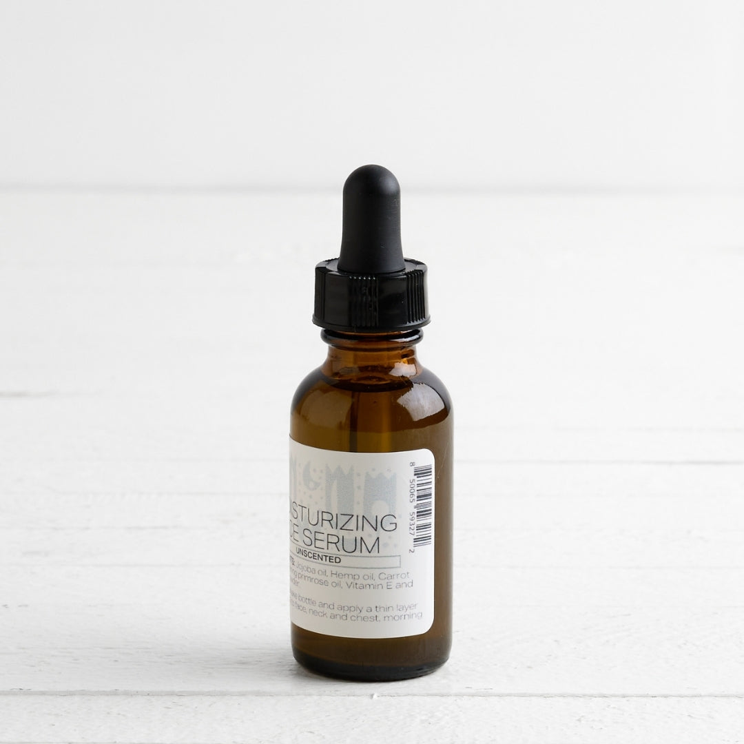 Brown glass bottle with dropper on a white background