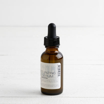 Brown glass bottle with dropper on a white background