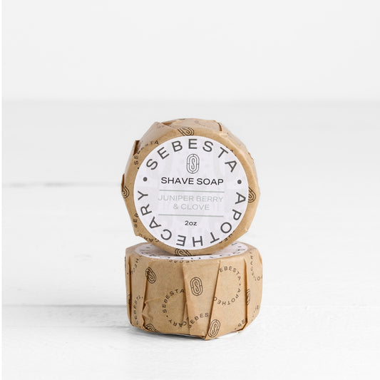 2 round bars of soap stacked with Sebesta Apothecary Branding on white background