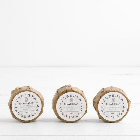 3 round bars of soap with Sebesta Apothecary Branding on white background