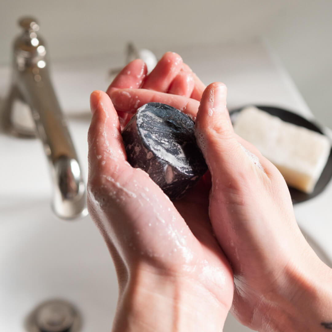 Sebesta Apothecary Zero Waste Activated Charcoal Face Wash Bar In Hands